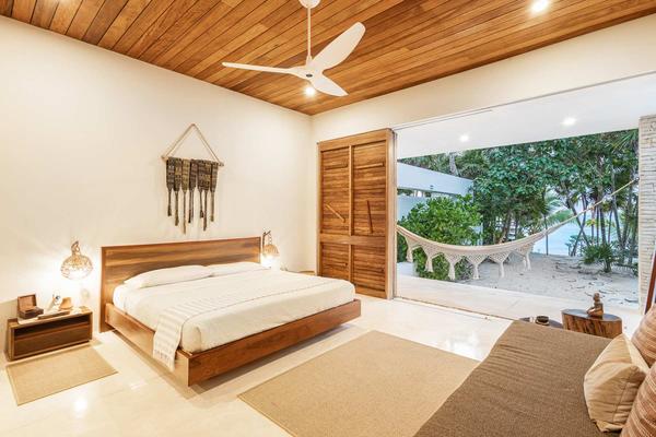 Nature-Inspired Villa by the Caribbean in Tulum